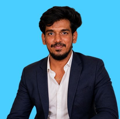 Portrait of Bala Sundaram in a navy blazer